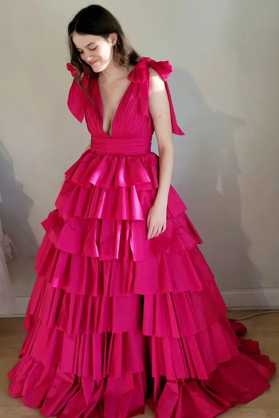 pink prom dress with ruffled layers 