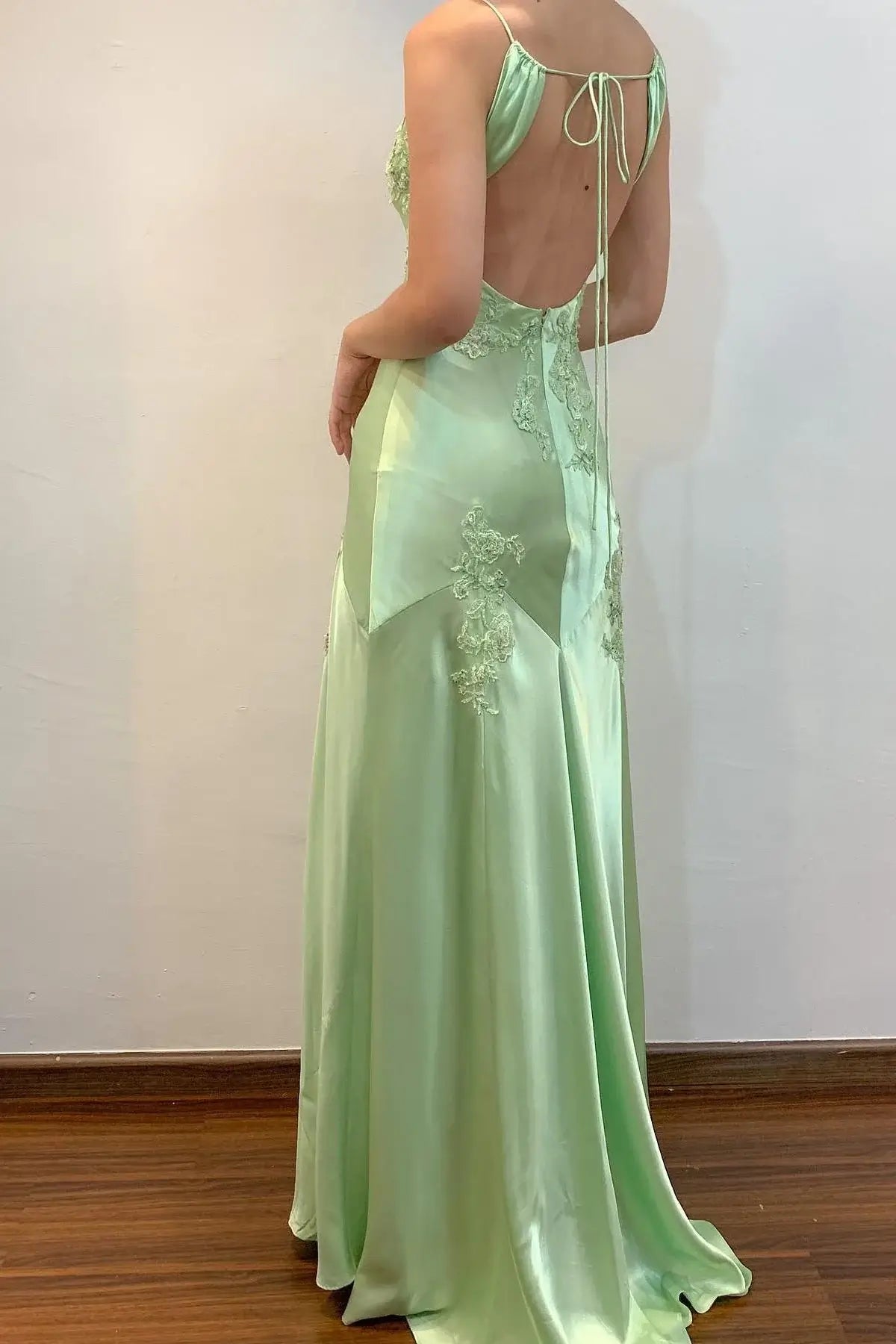 Light green evening gown with thin straps  