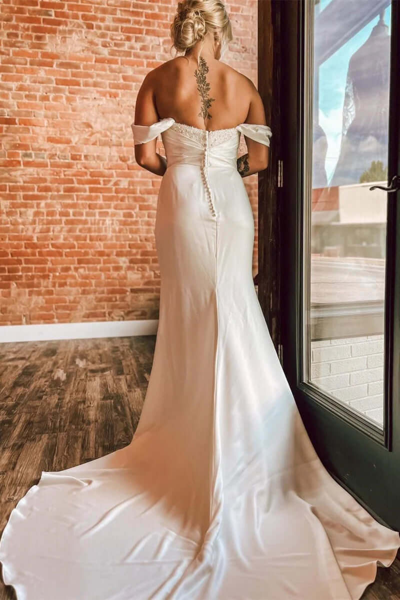 Woman in a white off-shoulder wedding dress 