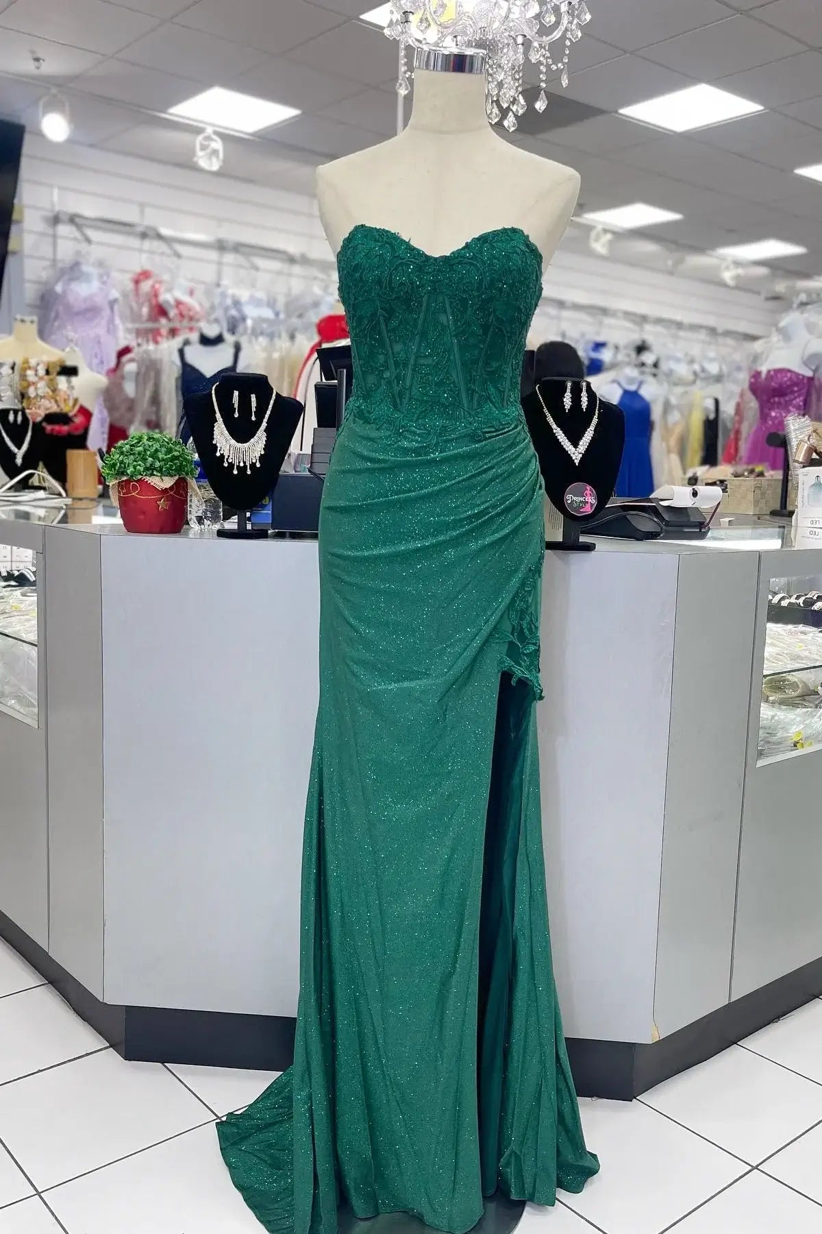 Green strapless evening gown