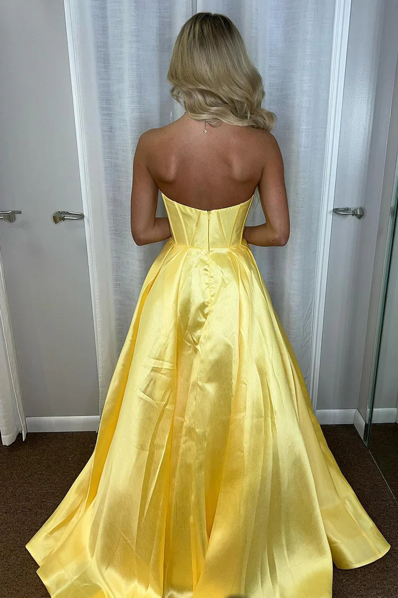 yellow strapless evening gown