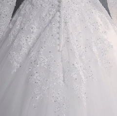 Una línea de encaje apliques mangas largas cuello alto vestidos de novia musulmanes