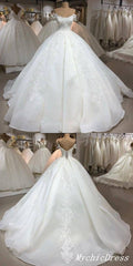 Precioso vestido de novia de encaje blanco con hombros descubiertos